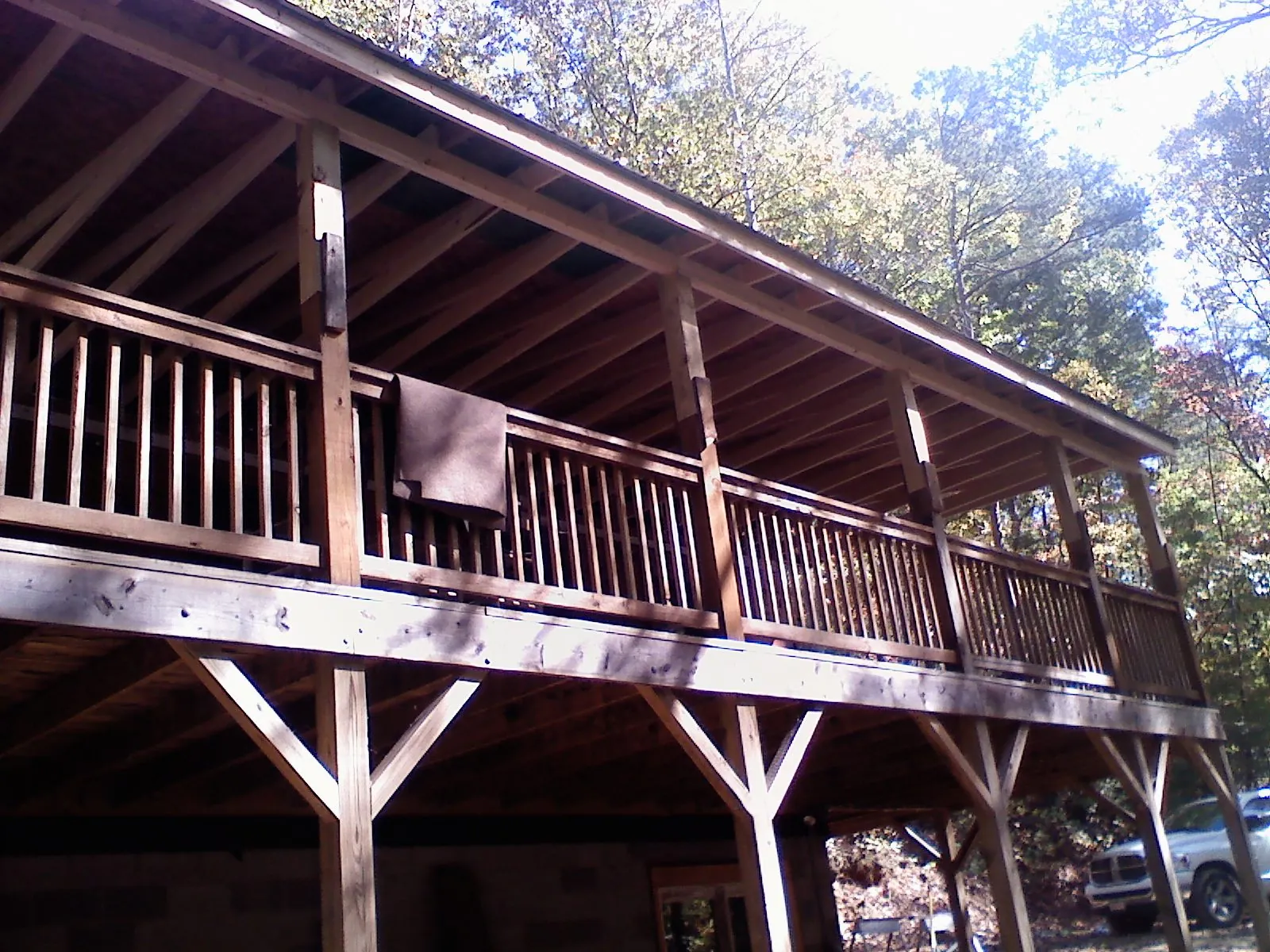 Timber framing under a new elevated porch and deck — Roof Leak Repair in Uniontown by Roofing Brothers
